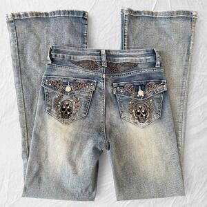 Urban Weekend blue flare  jeans with skull and wings